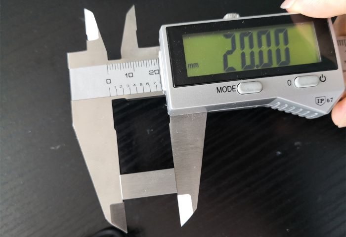 gauge block being measured with callipers